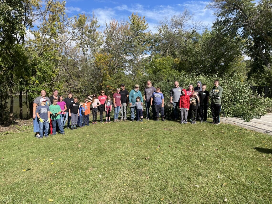 Volunteers Removing Buckthorn From City Property