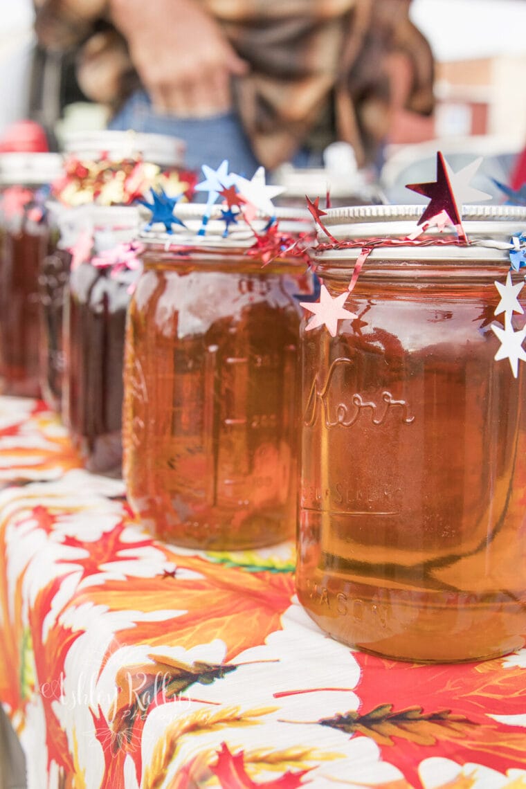 Jars of maple syrup lined up