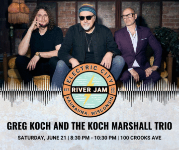 Promotional image for the Electric City River Jam featuring Greg Koch and the Koch Marshall Trio. Three musicians seated in front of a brick wall, with event details overlaid: Greg Koch and the Koch Marshall Trio performing on Saturday, June 21 from 8:30 PM to 10:30 PM at 100 Crooks Ave, Kaukauna, Wisconsin.