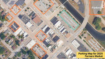 Image of a map showing the farmer's market location in the parking lot behind 2nd street businesses. Map also shows available parking areas in various areas such as Riverview Middle School, Municipal Services Building, and various lots off of Third Street.