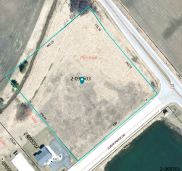 Aerial view of the lot, which is square-shaped on the corner of Evergreen Drive and State Highway 55
