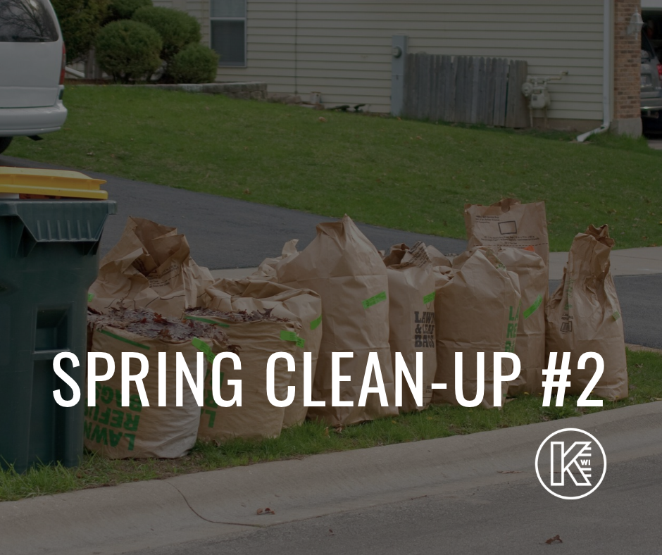 Picture showing yard waste bags waiting for pick up with the words spring clean up #1 and the City of Kaukauna Logo on the bottom